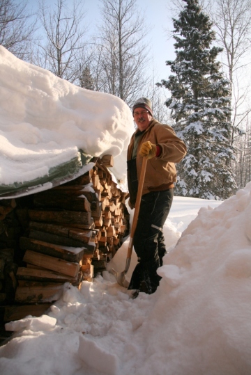 Last weekend--time to shovel four feet of snow off wood pile and carry wood into house.